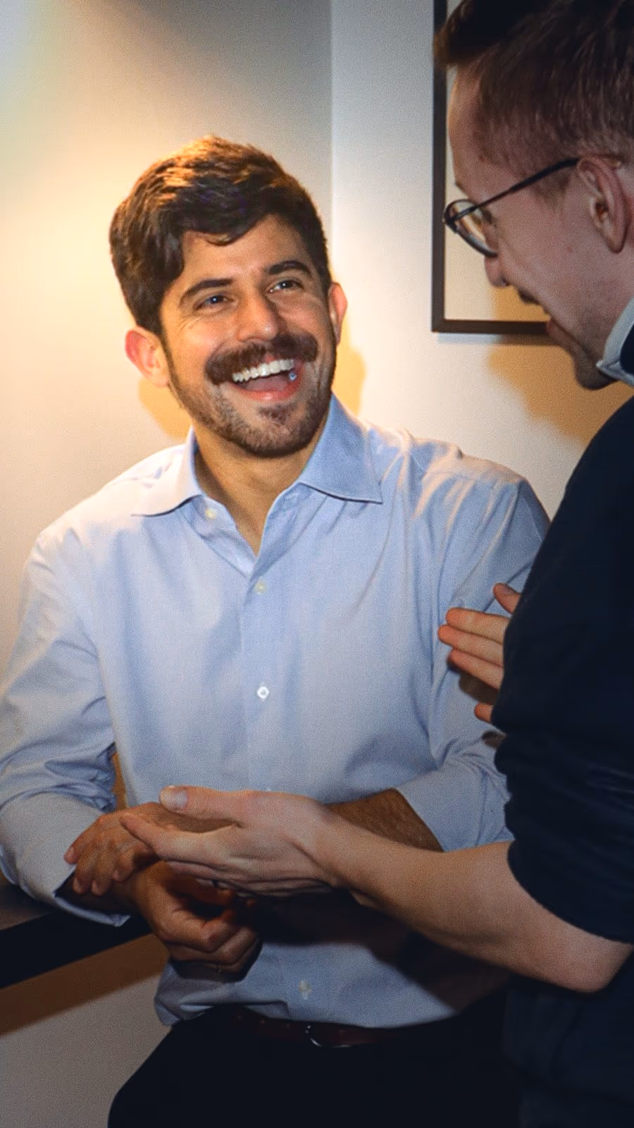Doug, owner of Ridge Paragon, laughing during a conversation